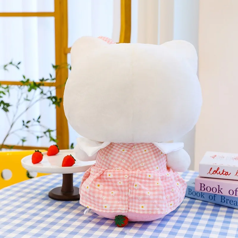 Sanrio Kawaii muñeco relleno de juguete lindo gato Hello Kitty en verano falda a cuadros niños regalo de cumpleaños niñas muñecas de peluche al por mayor