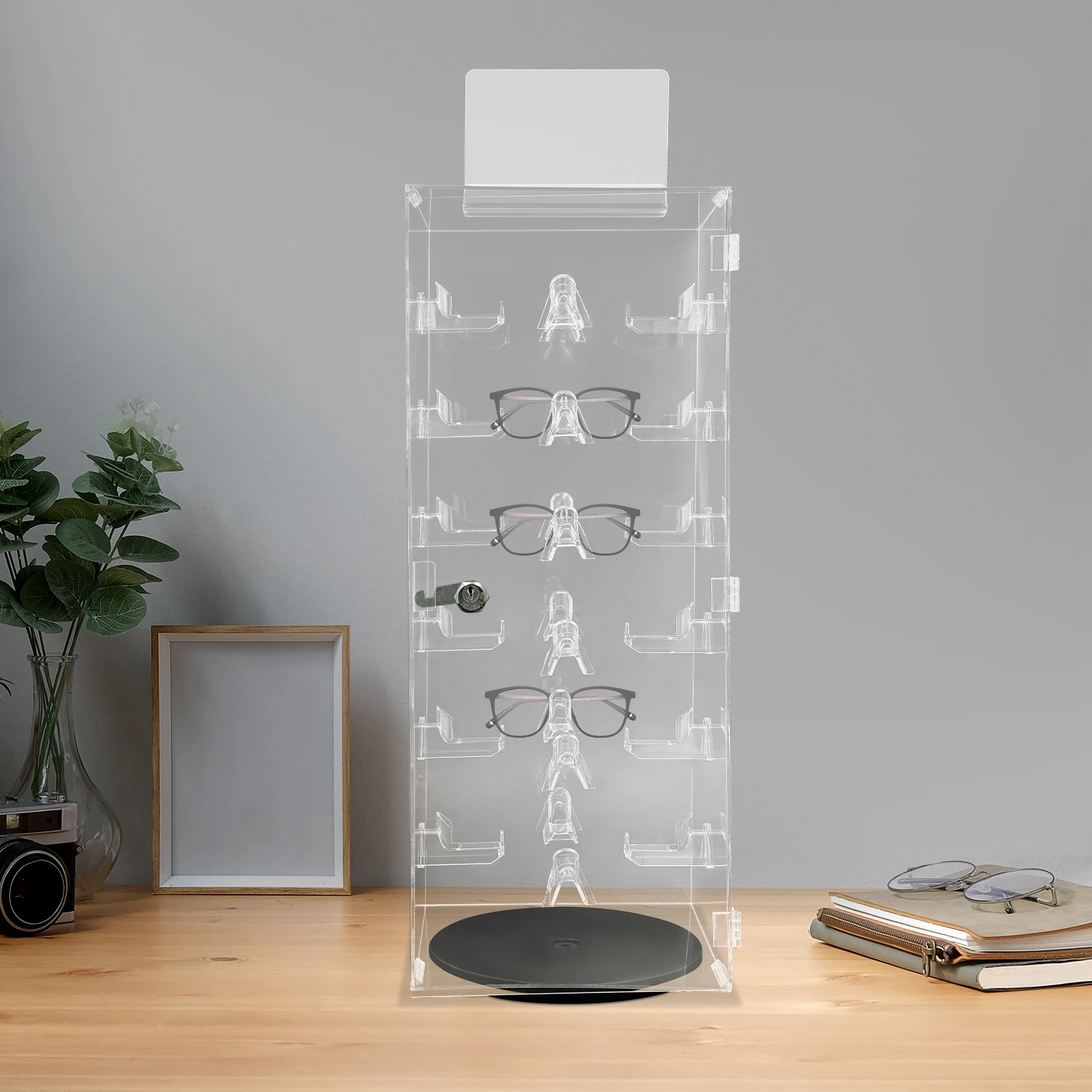 

Акриловый органайзер для солнцезащитных очков 360° ° Вращающаяся подставка для очков можно вместить 24 пары очков.