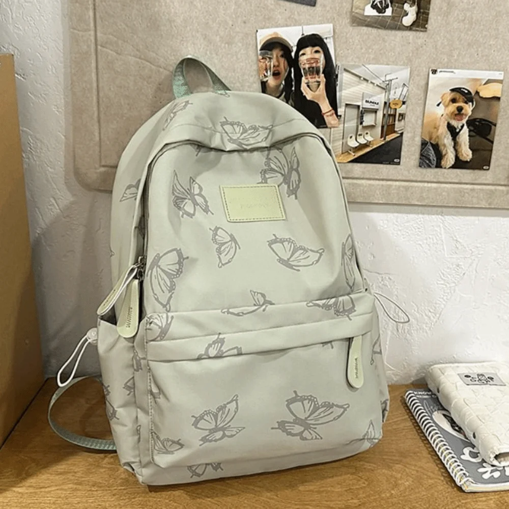 حقيبة ظهر صغيرة مقاومة للماء على شكل فراشة على الطراز الكوري بلون سادة وسحاب حقيبة كتف للياقة البدنية حقيبة يد كاجوال على الظهر في الهواء الطلق