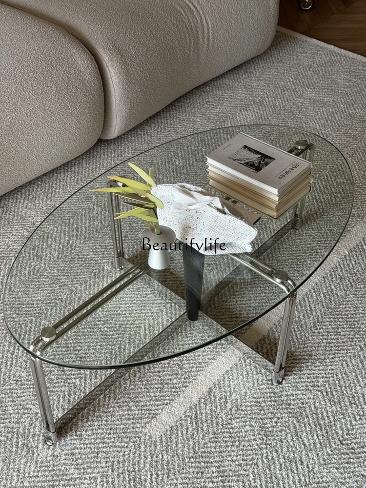 

Stainless steel glass oval special-shaped small apartment high-end wrought iron retro coffee table