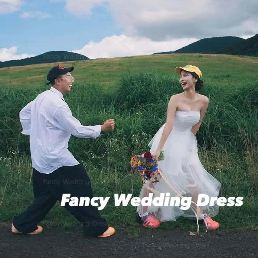 

Fancy Irregular Strapless Wedding Dress Korea Women Evening Dresses Soft Tulle Sleeveless Bridal Gown Customized