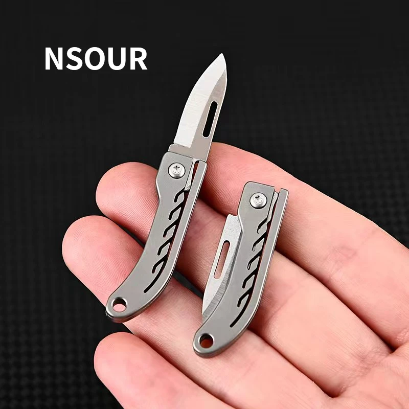 

Titanium alloy mini portable keychain with high hardness D2 steel sharp knife portable unpacking and express delivery knife