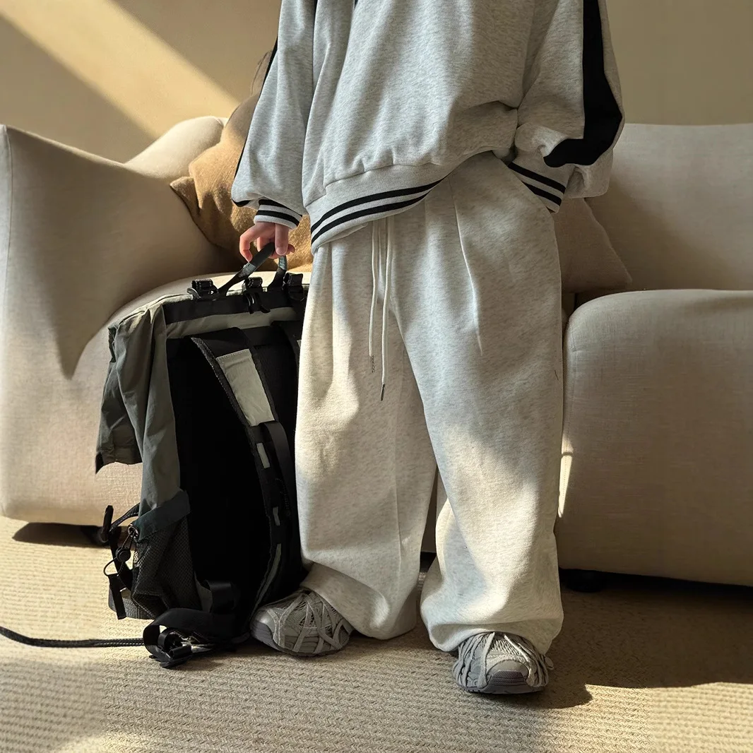 ملابس أطفال للأولاد سراويل تقليدية لربيع وصيف 2025 عصرية جديدة بلون سادة بسيطة للأطفال سراويل فضفاضة بسيطة بطول كامل