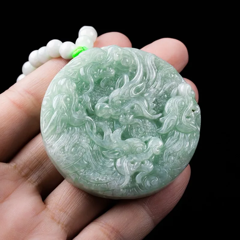 Jade birmano natural de calidad superior: colgante redondo con la imagen de los nueve dragones, con exquisitos grabados a doble cara.