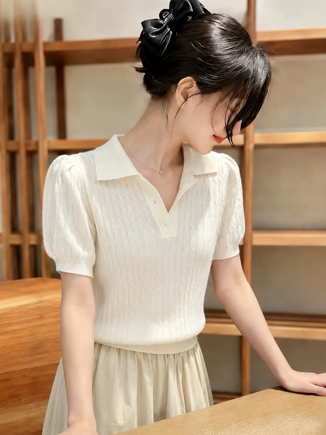 

Comfortable Knitted Ice Silk Short Sleeve Sweater with Twist Flip Collar for Women Fashionable Slimming Korean Styl...