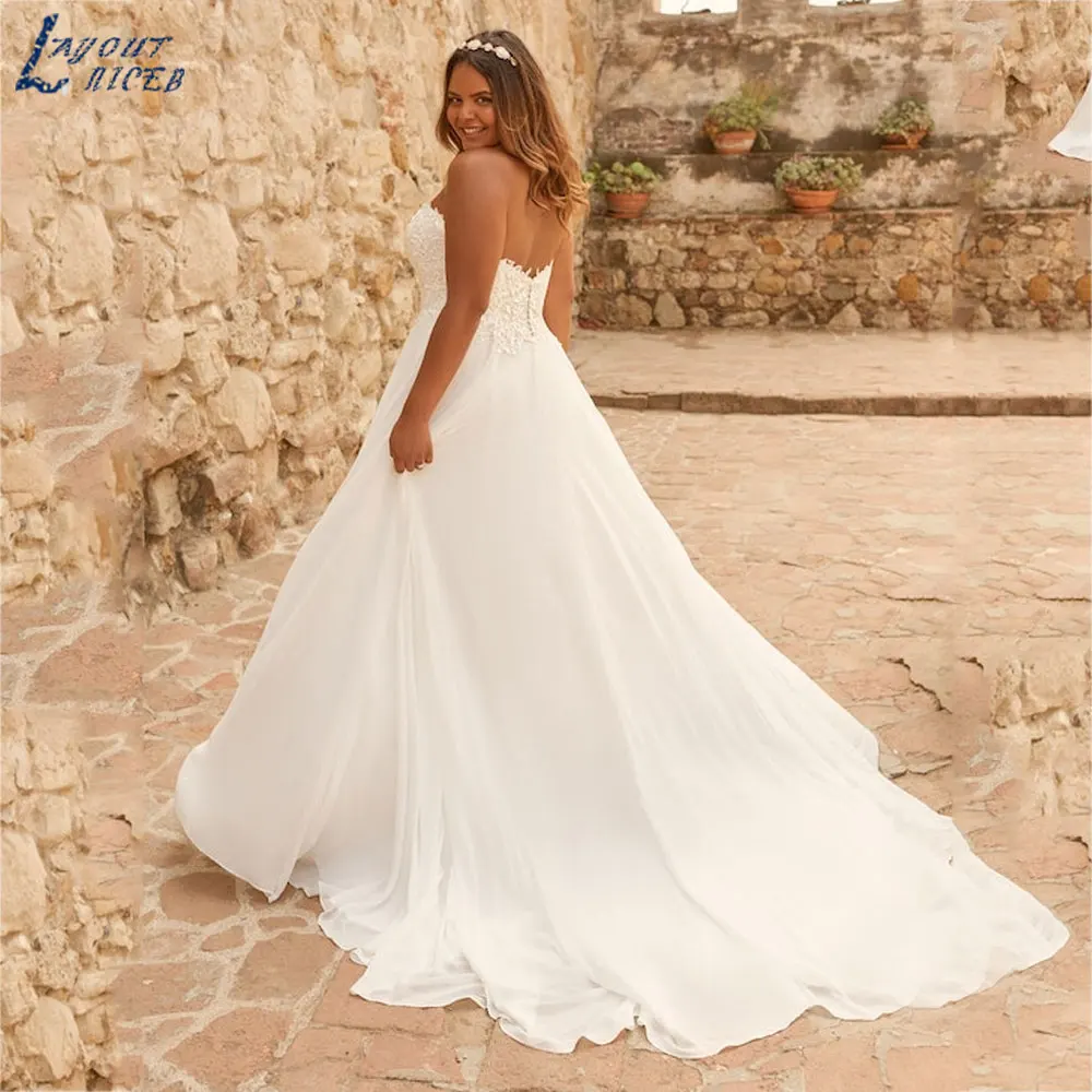 LAYOUT NICEB Strapless Apliques Chiffon Vestidos De Casamento Sem Mangas Backless Vestido De Noiva Side Slit suknia ślubna Custom Made 2024LAYOUT NICEB Strapless Apliques Chiffon Vestidos De Casamento Sem Mangas Backle