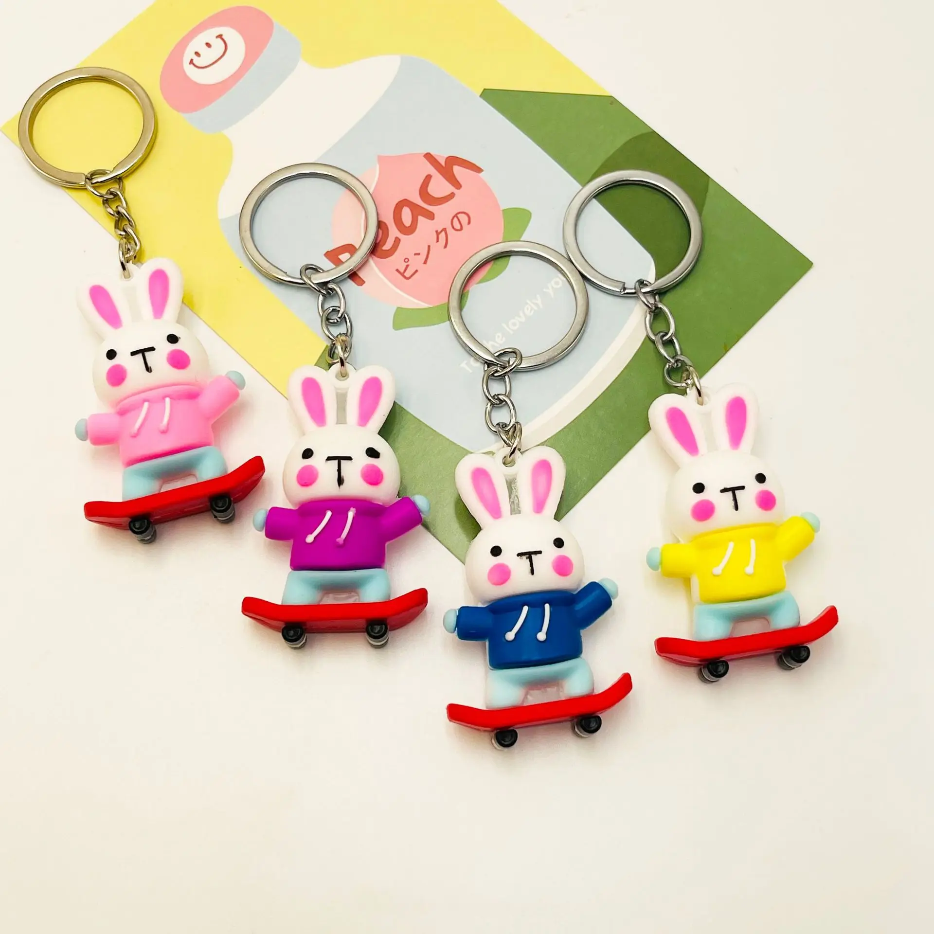 Cute rabbit keychain personality trend skateboard rabbit doll keychain bag pendant activity gifts