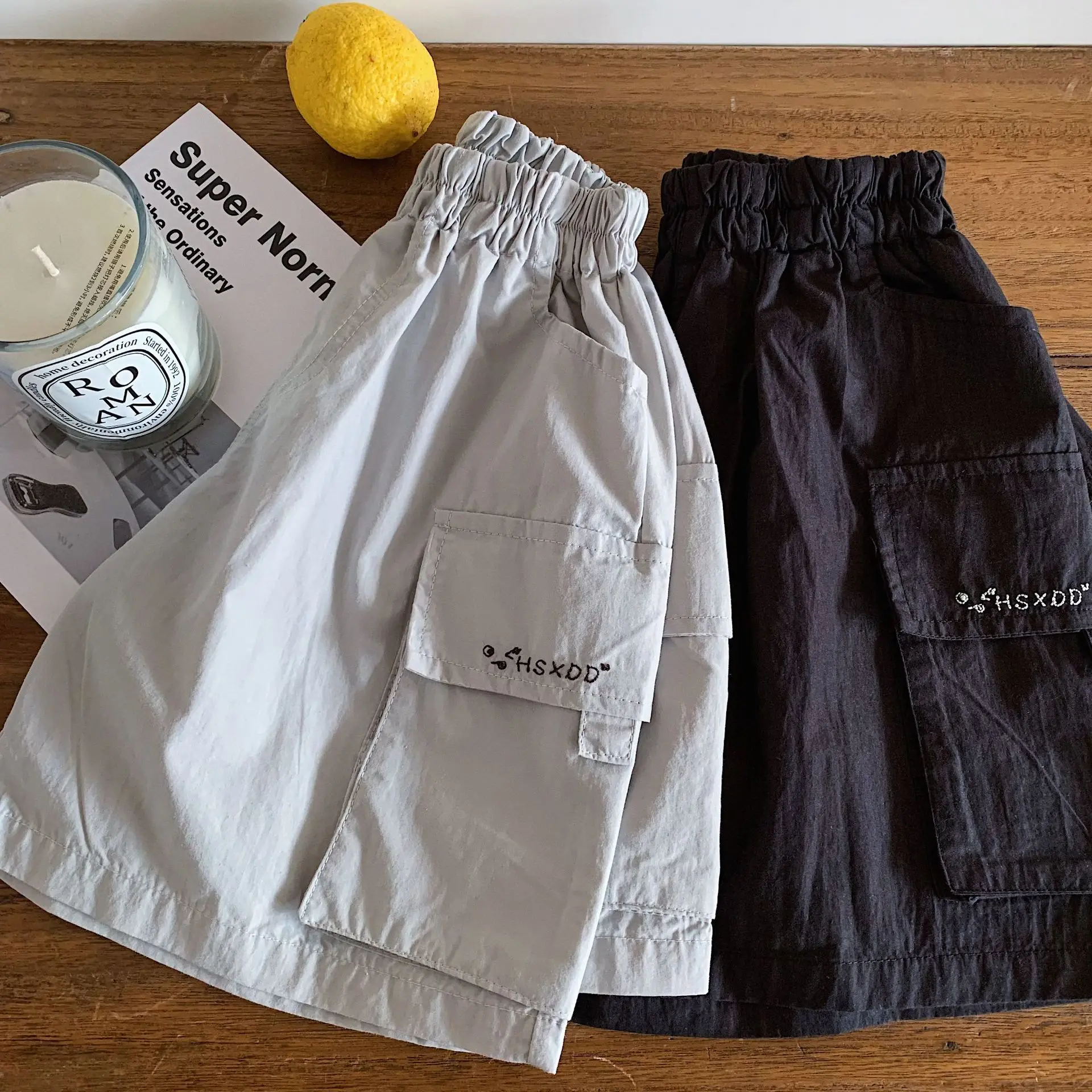 Children's shorts 2026 summer new Korean version boys' pocket work pants baby solid color pants versatile trend