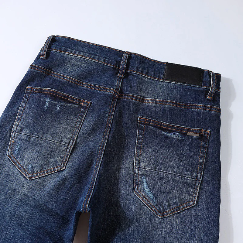 Fashionable Y2K men's jeans, washed with nostalgia, elastic, slim fit, perforated patch, deep blue jeans, high street hip-hop br