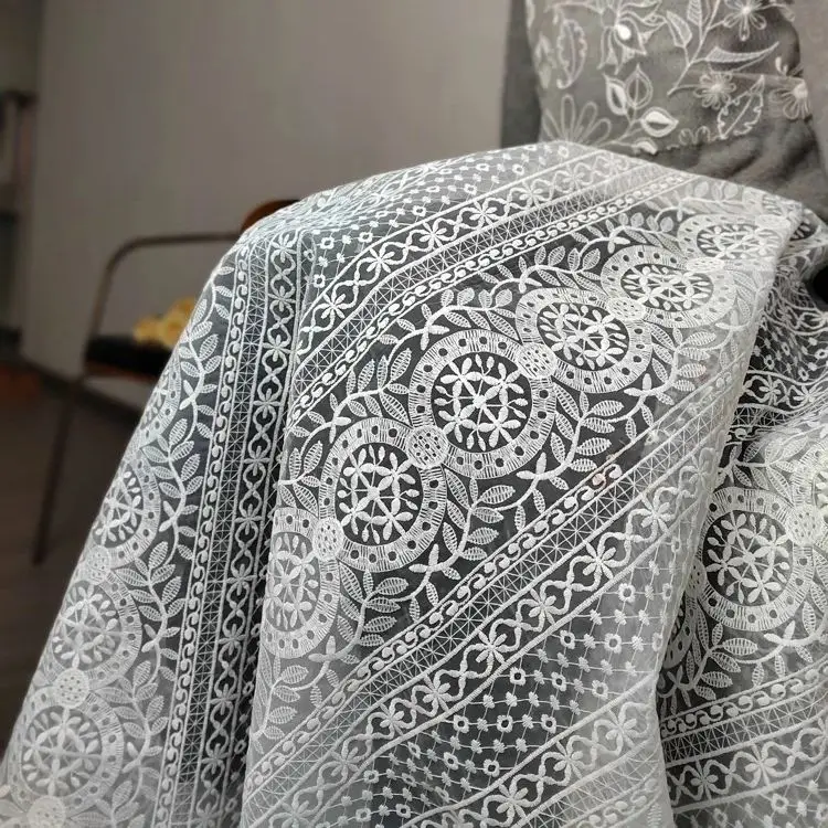 

High-end exquisite glass yarn milk silk embroidered fabric with carved holes suitable for wedding dresses, sold by the meter