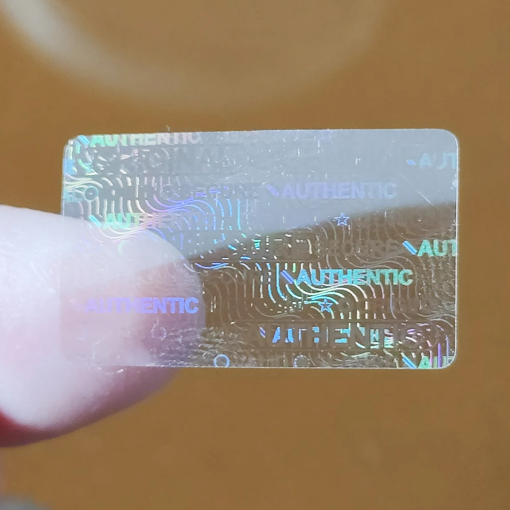 8000pcs 25x15mm Transparent Hologram Authentic Seal Light holographic sticker Universal Original Genuine Anti-fake Label Sticker