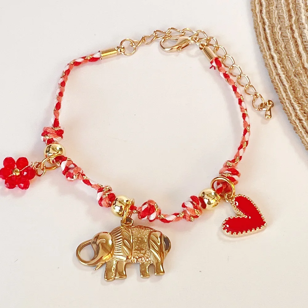

Handmade Bracelet Featuring Braided Red & Gold Rope with 3 Pendants-Heart, Elephant, Flower Fun Gift for Every Day Wear