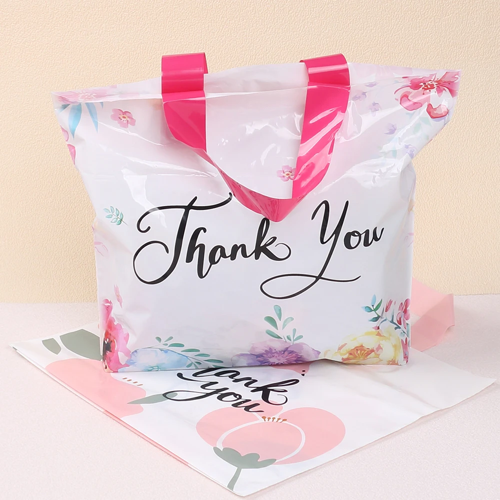 Sacs cadeaux de remerciement avec poignée, sacs de courses réutilisables à motif floral, sacs en plastique pour magasins de vêtements, cadeaux de mariage et de fête d'anniversaire, 20/50 pièces