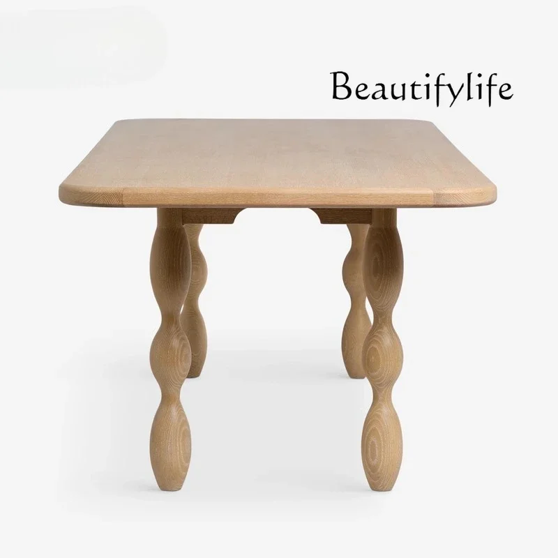 

Solid wood dining table French medieval wabi ash wood log table household simple designer rectangle high sense