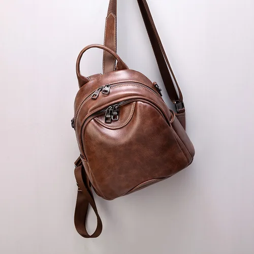 Imagen 1 del producto Mochila pequeña de cuero suave para mujer, bolso escolar de cuero PU para adolescentes, bolso de viaje de hombro Vintage, alta calidad