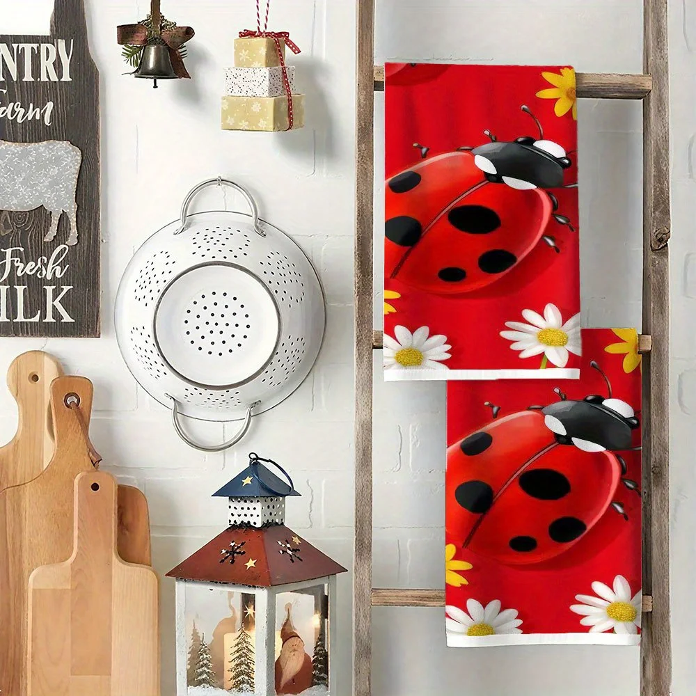 2-Piece ladybug and daisy pattern towel set with red background