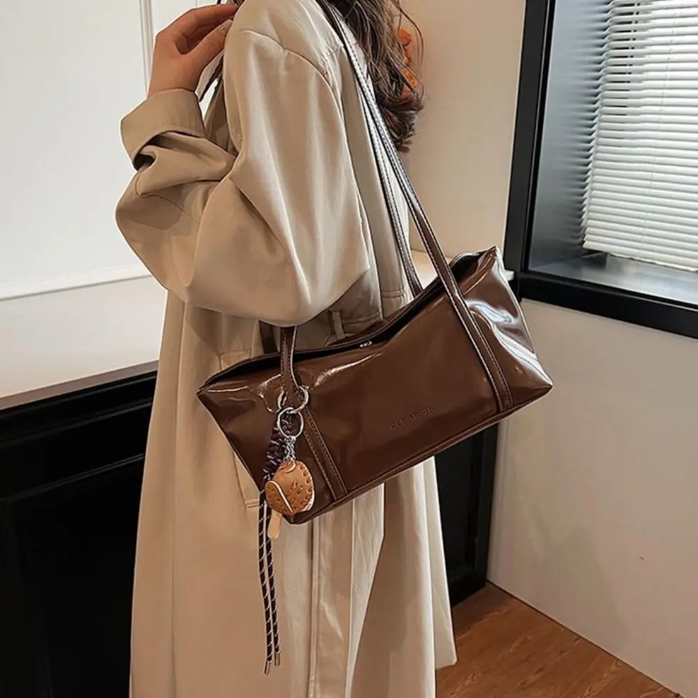 

Korean Style Boston Pillow Bag with Pendant Minority Design Pu Dumpling Bag Commuting Solid Color Retro Underarm Bag Travel