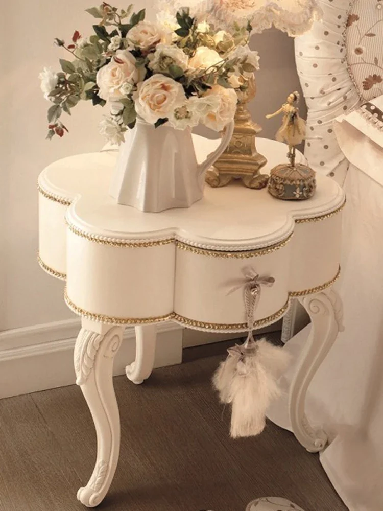 The product can be customized. French light luxury solid wood bedside table petals