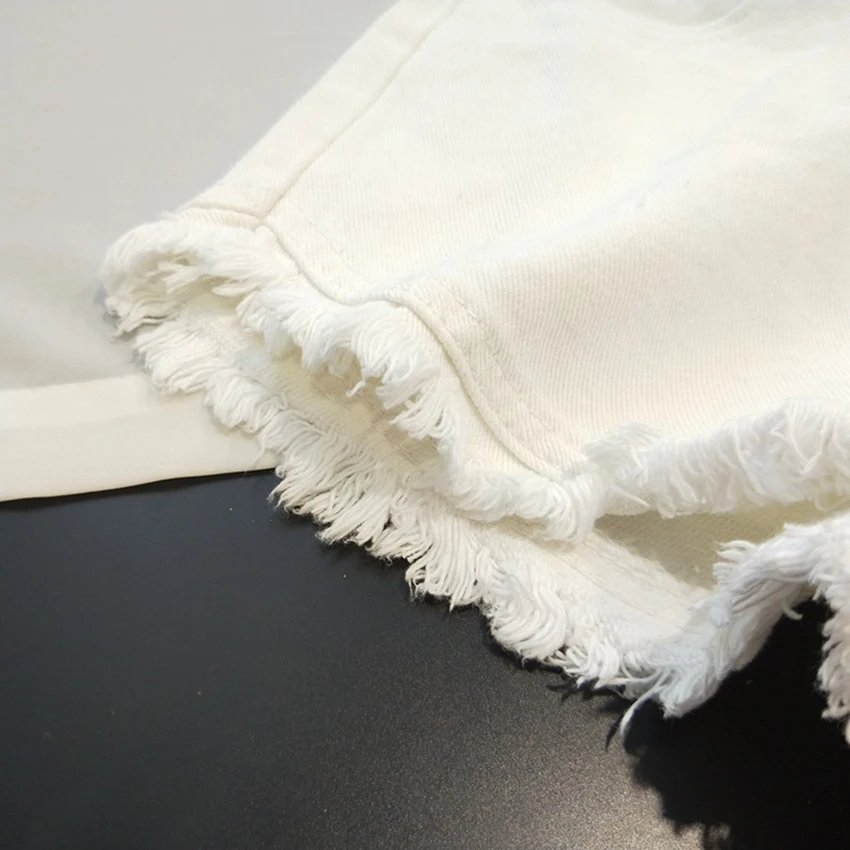 Pantaloncini di jeans estivi da donna Pantaloncini con frange tinta unita a vita alta Jeans corti femminili di base alla moda retrò americana
