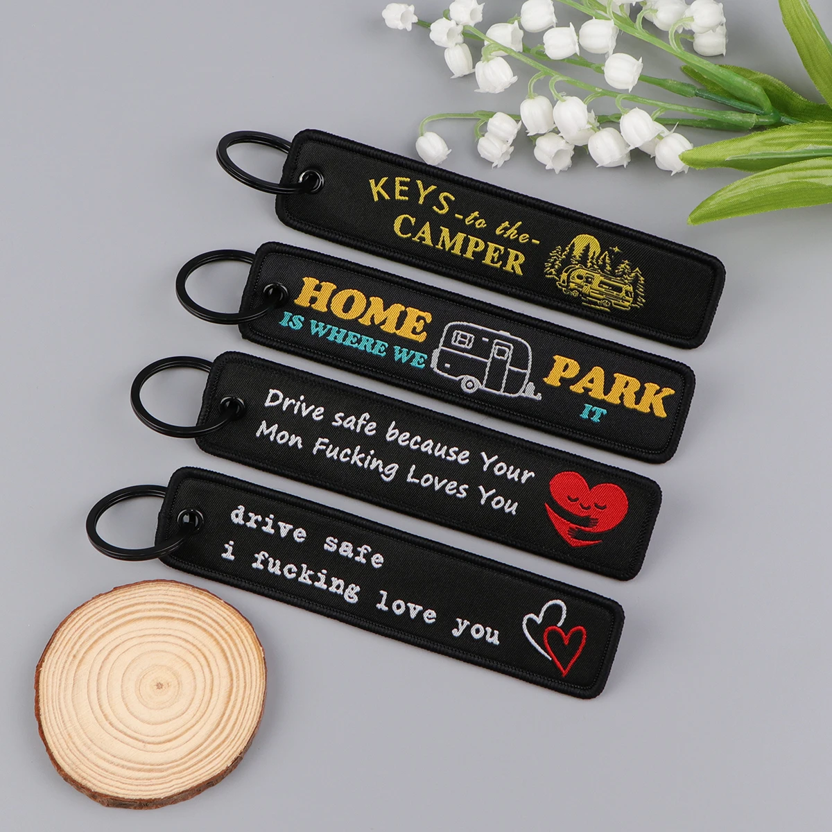 Beberapa penawaran seri bordir kunci cincin Tag bagasi untuk penerbangan gantungan kunci untuk mobil sepeda motor kunci Aksesori liontin