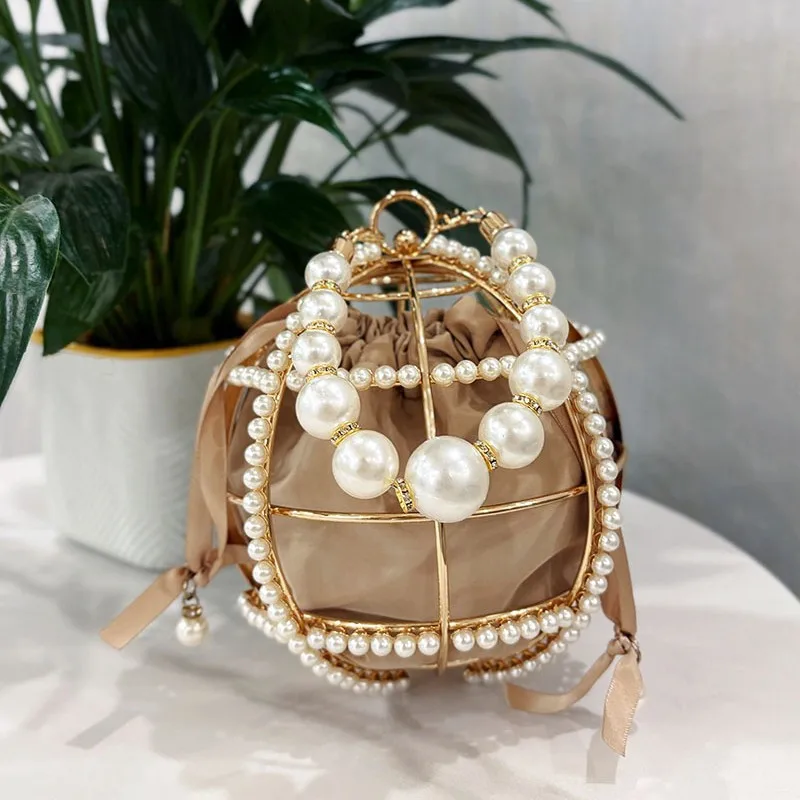 

Xiaoxiangfeng spherical hollow handbag fashion metal vegetable basket pearl bird cage bucket dinner bag