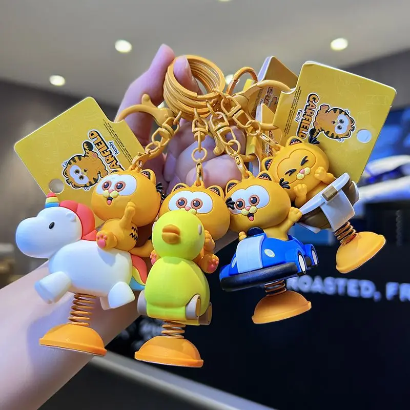 Lindo llavero de Garfield, adorable llavero de dibujos animados, colgante para mochila, juguete decorativo antiestrés