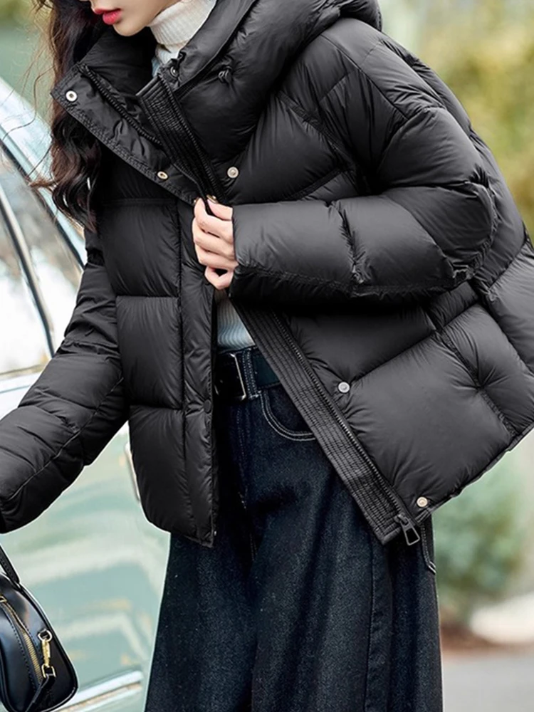 

Модная женская зимняя куртка-пуховик Sli Thi: элегантная, теплая и стильная