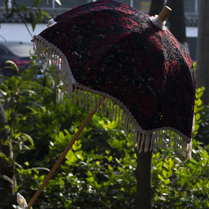 مظلة دانتيل عتيقة بمقبض طويل