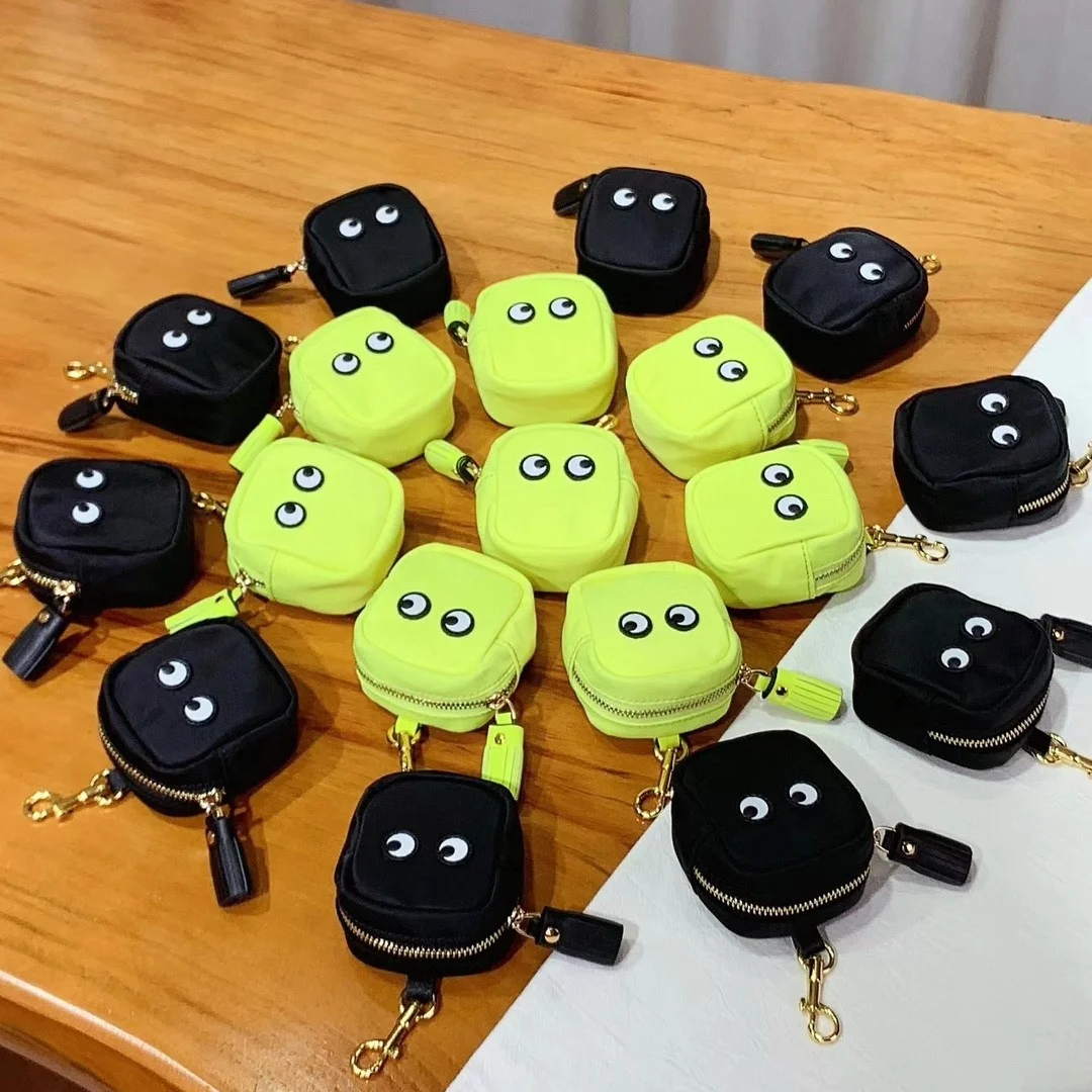 custodia-protettiva-anya-tassel-per-cuffie-portachiavi-e-accessori-nuova-con-etichette