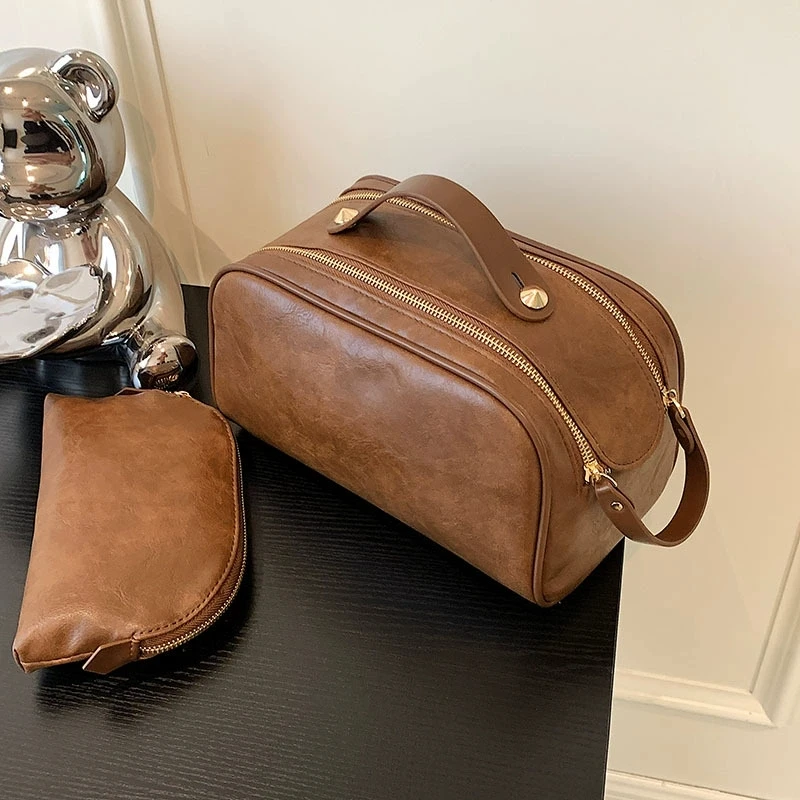 

Travel Portable Simple Fashion Makeup Bag Large Capacity Solid Color PU Zipper Toilet Bag Handheld Makeup Bag Mother Bag