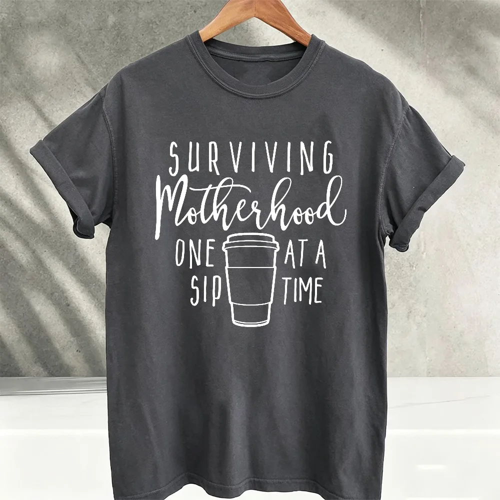 Surviving Motherhood One Sip At A Time Coffee Mom Graphic T-Shirt Mom Life Quote Coffee Cup Unisex Mommy Daily Wear Cotton Tees