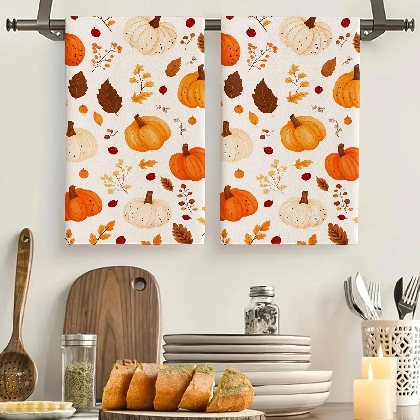 Two hand towels with orange and white pumpkin, autumn maple leaves and red berries