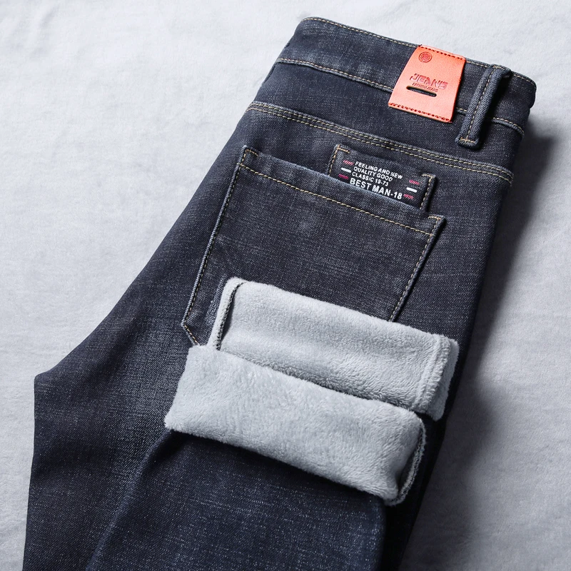 

2025 Winter Warm Jeans Men Slim Stretch Male Denim Pants Thicken Jeans With Fleece Fashion Pockets Desinger Mens Clothing