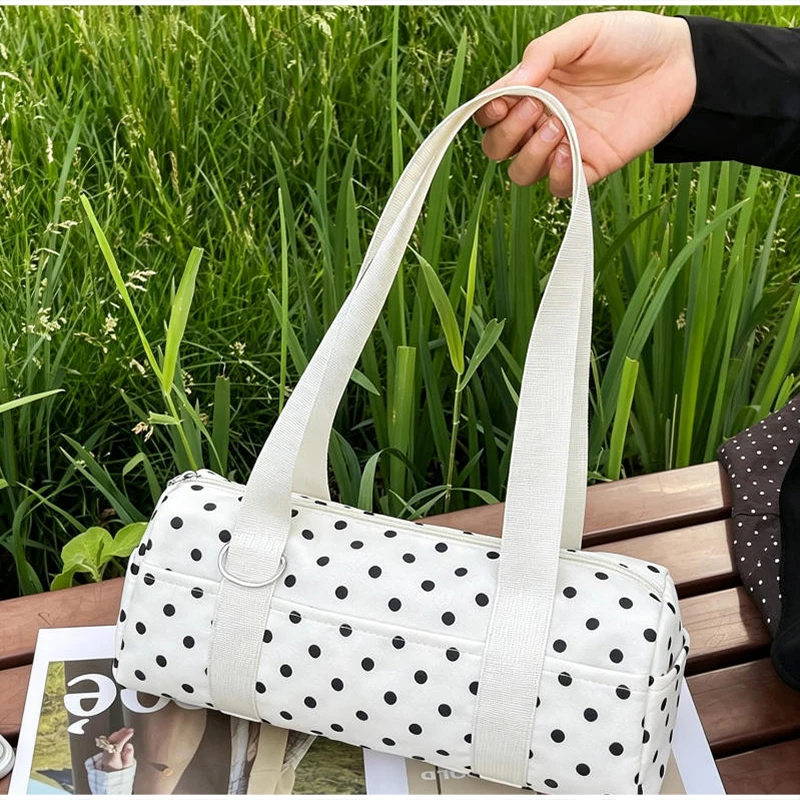 Gepunktete Schultertasche in langem Zylinderformat, Damen-Handtasche mit Tragegriff, zylindrische, leichte, schicke Tragetasche für den Arbeitsweg – Detail 15