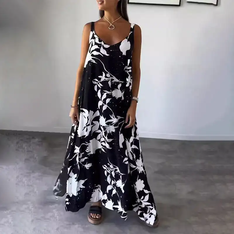 Fluid dress with thin straps, sleeveless and uncovered on the Women's Floral Spaghetti Strap Sleeveless Backless Flowing Dress