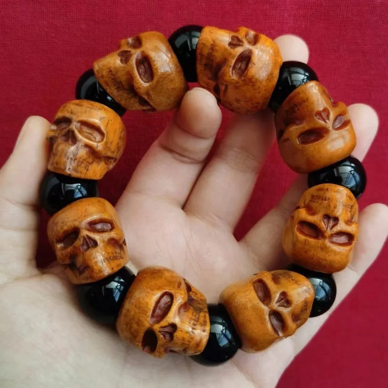 Tibetan- camel yak bone accessories featuring an aged carved design with a national-style lotus and six-side