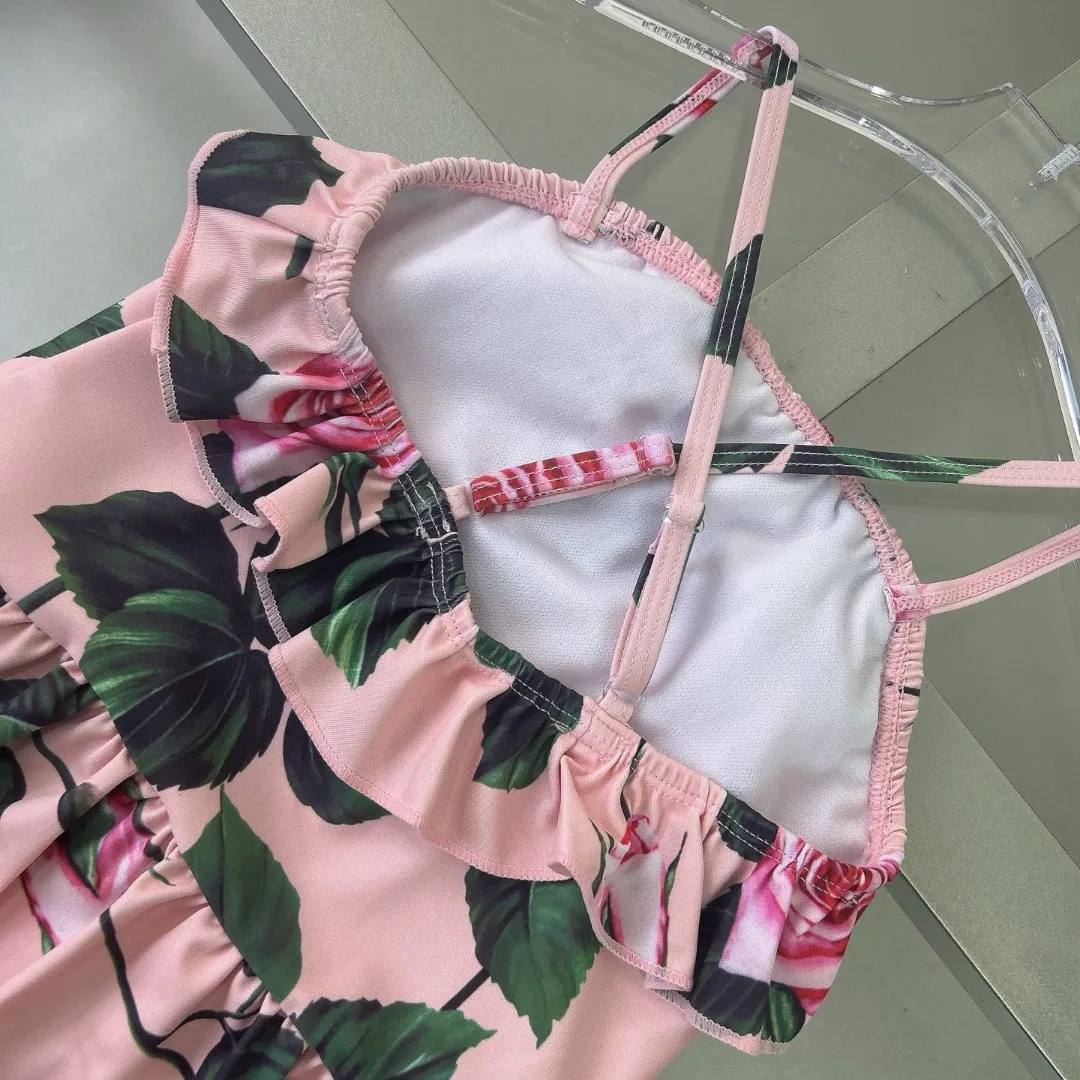 2025 nieuwe roze meisjesbadpak meisjes bikinizwempak met bloemenprint uit één stuk sling-badpak kwaliteit kinderzwemkleding
