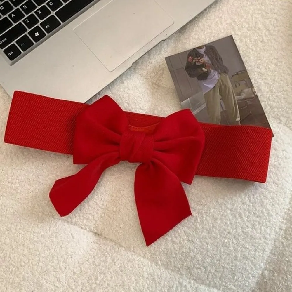 เข็มขัดผ้าเนื้อนุ่มแบบยืดหยุ่น ประดับโบว์ใหญ่ ดีไซน์หวานหรูหรา เหมาะสำหรับชุดราตรีและกระโปรง