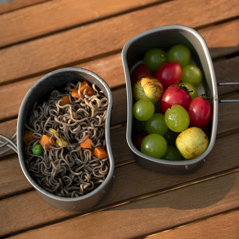 طقم أواني طهي متعددة الوظائف للاستخدام الخارجي من التيتانيوم النقي، صندوق غداء محمول مع وعاء معلق خفيف الوزن للتخييم والتسلق