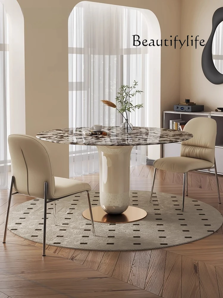 

French light luxury cream style painted marble dining table round modern simple supercrystalline stone dining table