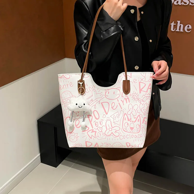 

2025 New Women's Graffiti Tote - Casual Fashion Preppy Style, Large-Capacity for Commute, Handheld/Armpit Carry