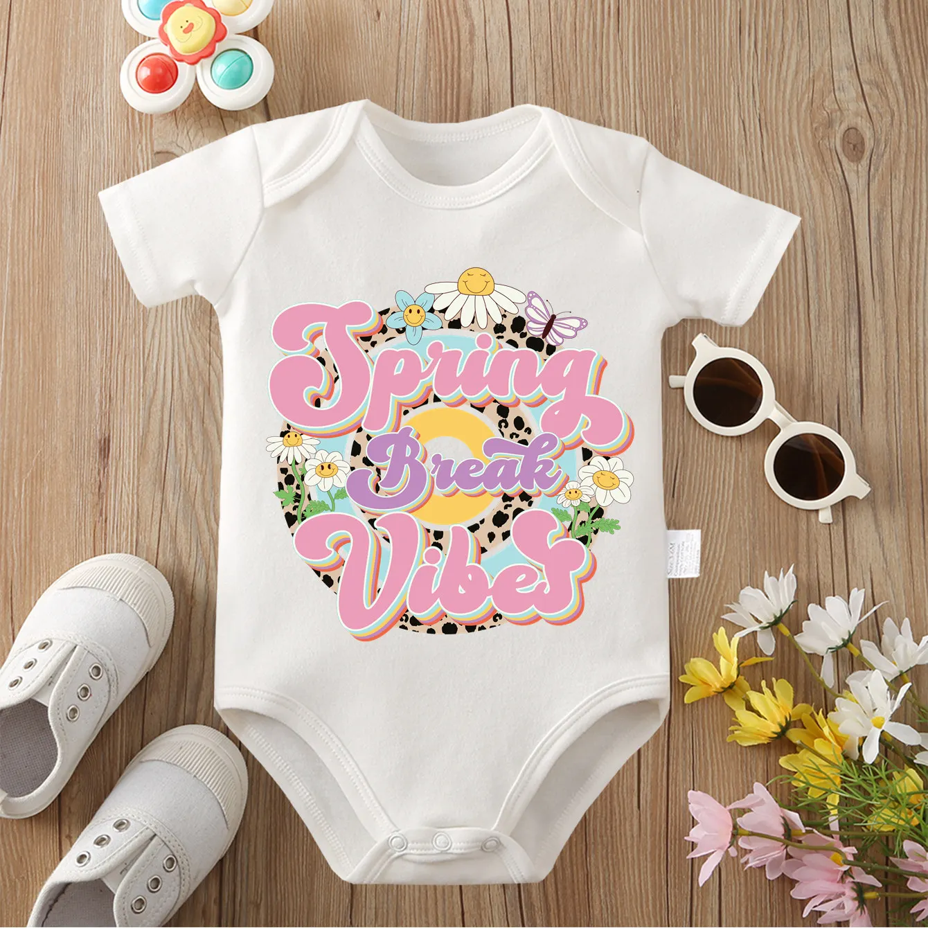 

Комбинезон-боди из 100% хлопка с принтом «Цветы и пчелы» для новорожденных от 0 до 12 месяцев. Удобная одежда для малышей.