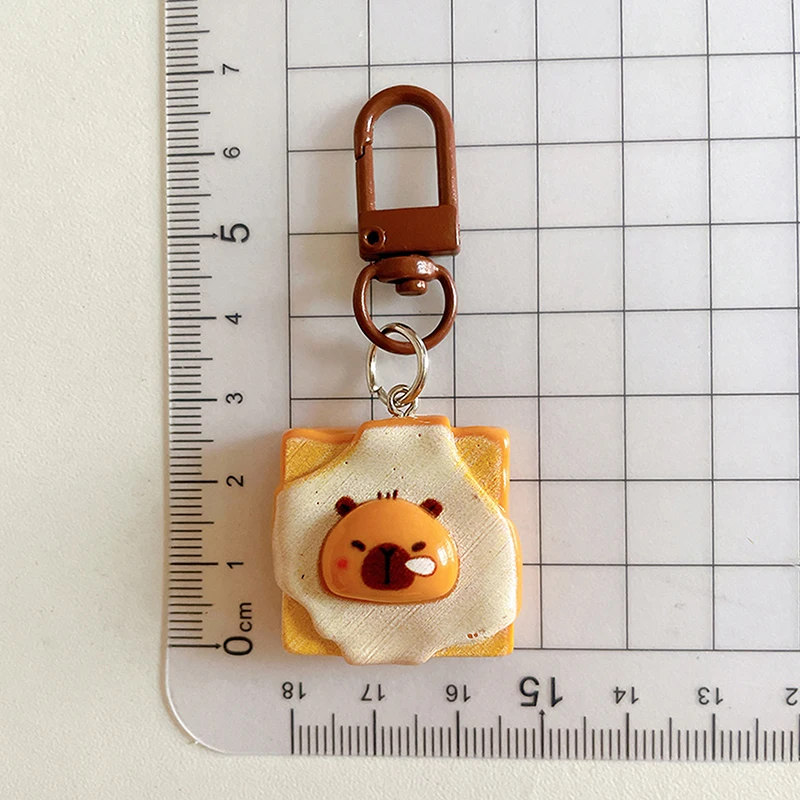 1Pcs New Creative Toast Bread Capybara Keychain Imitation Food Game Resin Keyring Student Girl Ornaments Backpack Pendant Gift