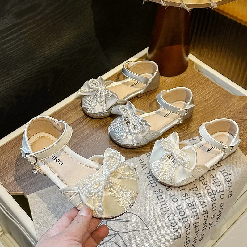 Sandal Musim Panas Anak-anak Sepatu Anak Perempuan Putri Serbaguna Catwalk Balita Sandal Datar Gaun Modis Anak Ikatan Simpul Manik-manik Musim Panas