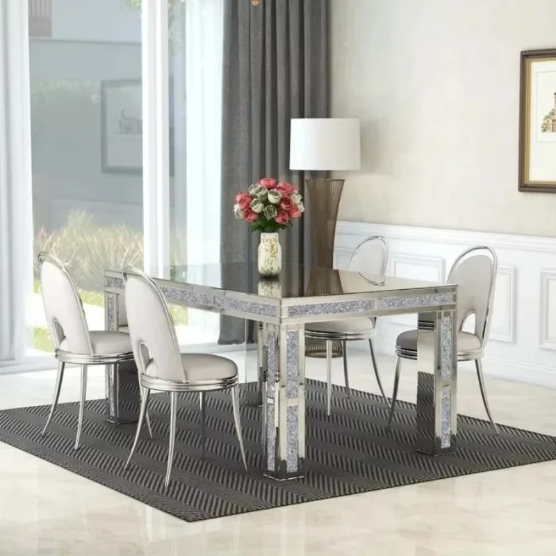Modern mirrored glass dining table with four legs and a rectangular crystal family hotel with broken diamonds
