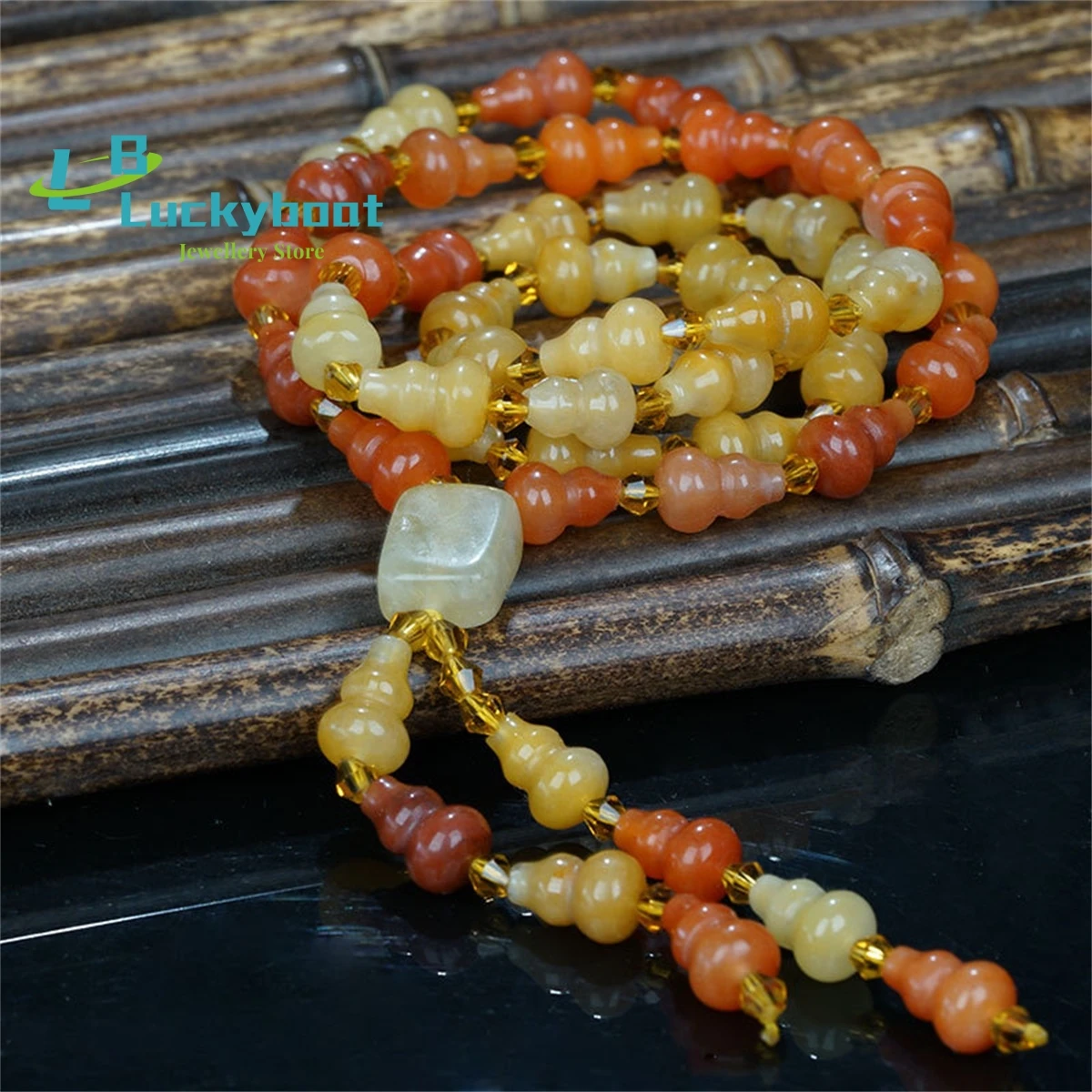 

Xinjiang Gobi Seed Jade Necklace Natural Gold Silk Jade Gourd Bead Sweater Chain Wholesale Charm Jewelry Fashion Women's Gift