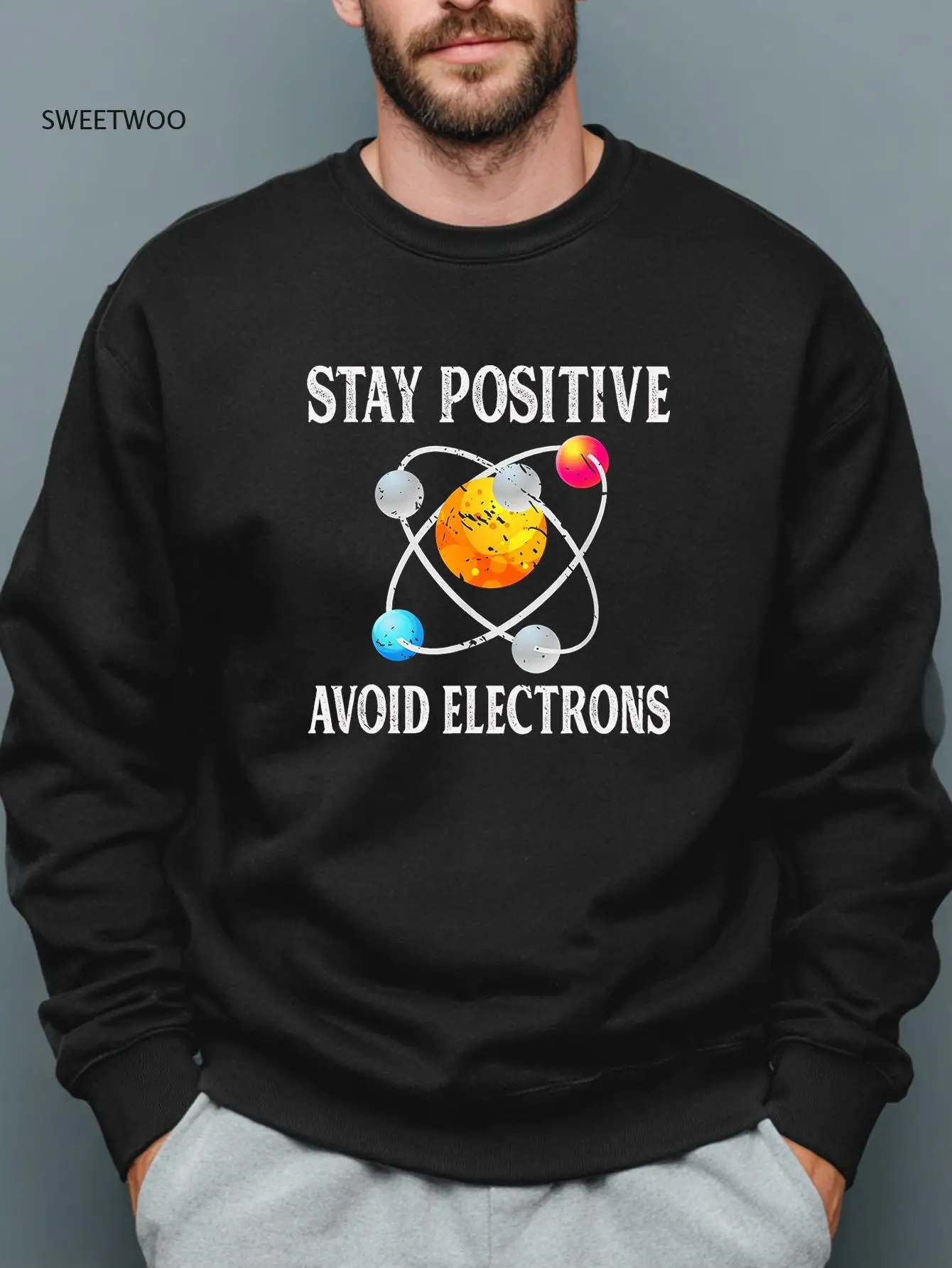 

Men's Long Sleeve Black Crew Neck Sweatshirt with "stay Positive Avoid Electrons" Graphic - Casual Pullover for Fall/winter