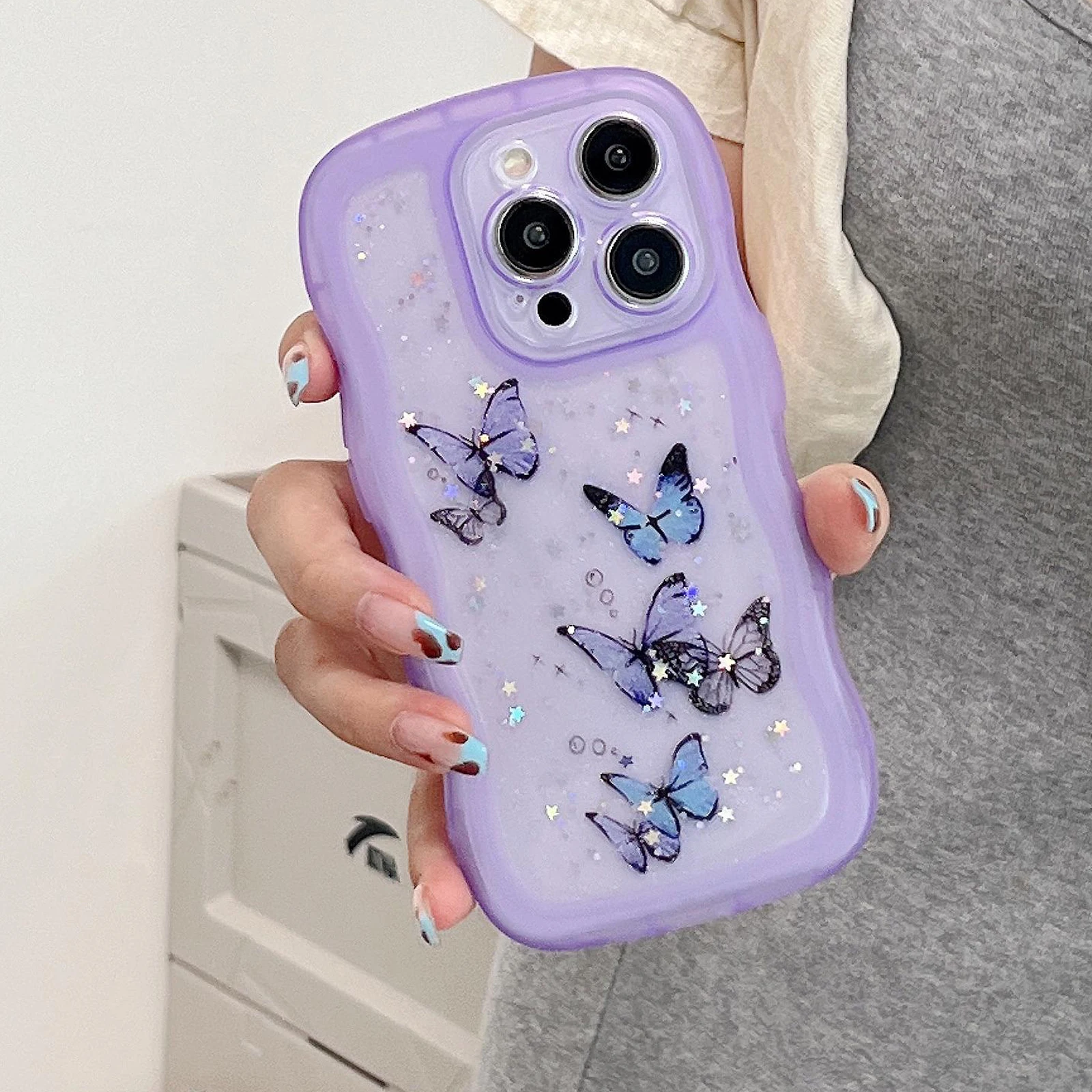 เคสโทรศัพท์เรซิ่นลายผีเสื้อประกายดาวหรูหรา ขอบหยักแบบไม่สม่ำเสมอ สำหรับ iPhone 11 12 13 14 15 16 17 Pro Max + Plus