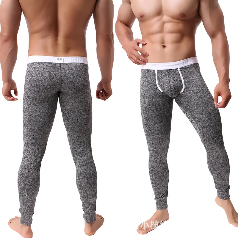 Mallas térmicas para hombre, pantalones largos con bolsa convexa en U, pantalones de pijama a la moda, pantalones finos y sexys para dormir, novedad