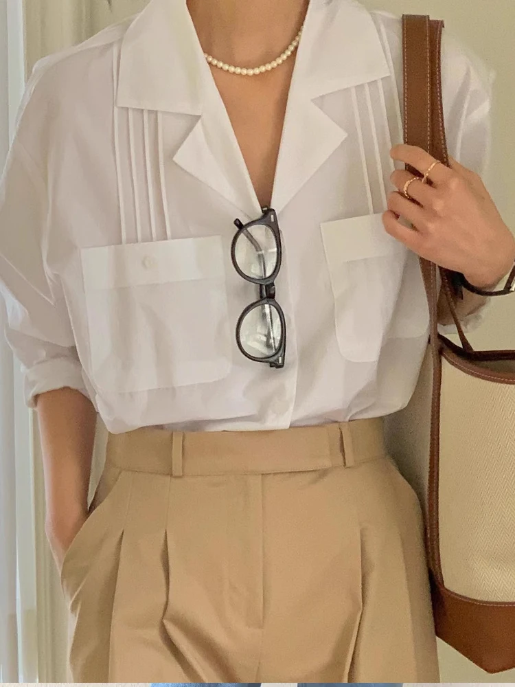 

Белая женская весенняя модная свободная блузка с воротником-стойкой и длинным рукавом в корейском стиле, однотонная, на молнии, для офиса